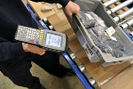 Picking and other tasks are managed using hand-held RF terminals.