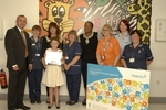 Lucy Boycott, seen with representatives of Whiston Hospital and Diversey Care, won first prize in an international design competition organised by Diversey Care.